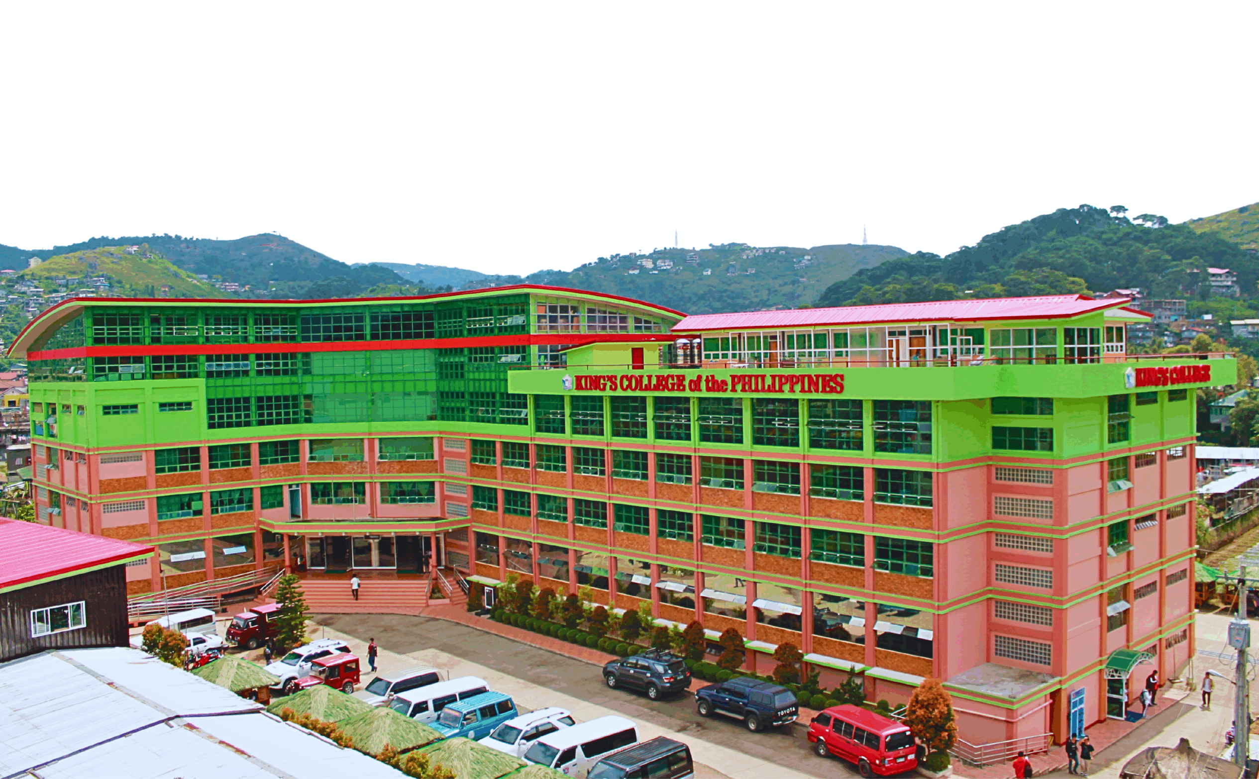 KCP campus building with students walking nearby